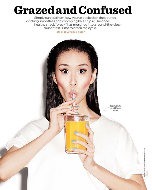 Portrait of girl drinking juice from a straw 