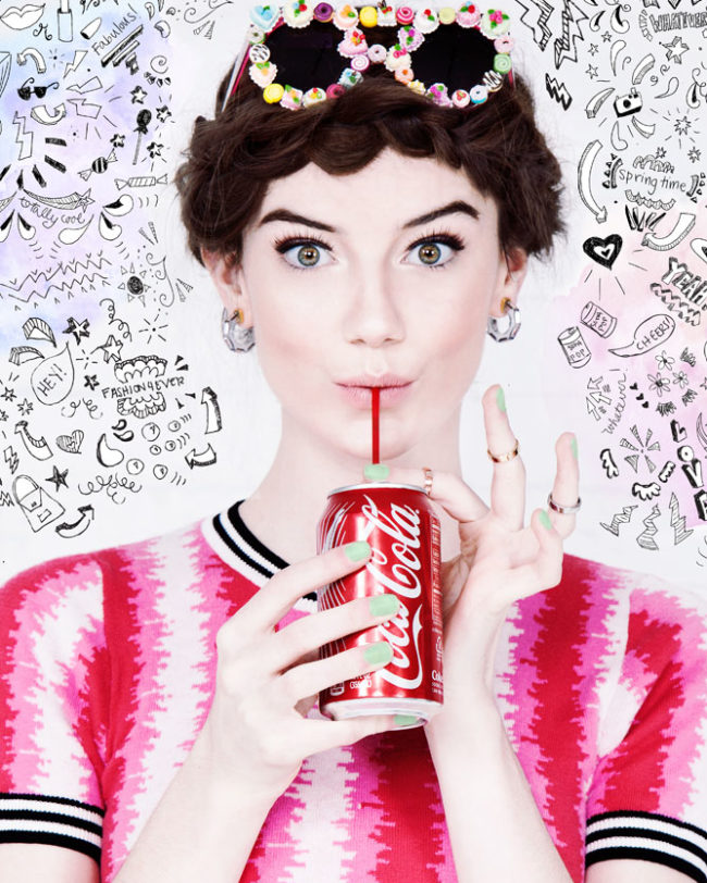 Girl drinking a coca cola